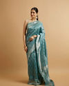 alt message - Mohey Women Light Blue Ikat Diamond Patterned Saree with Floral Motifs image number 0